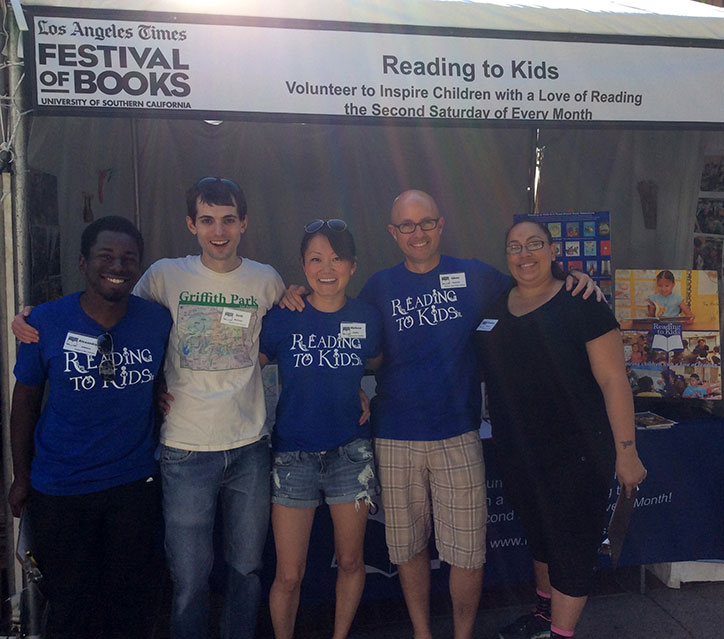 Volunteers at the Reading to Kids Festival of Books booth