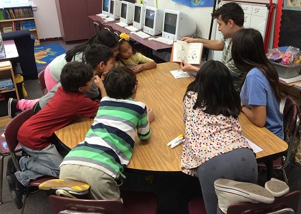 Reading to Kids at White Elem.