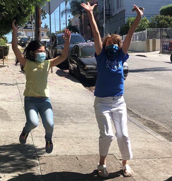 Naomi and Linda jumping in excitement