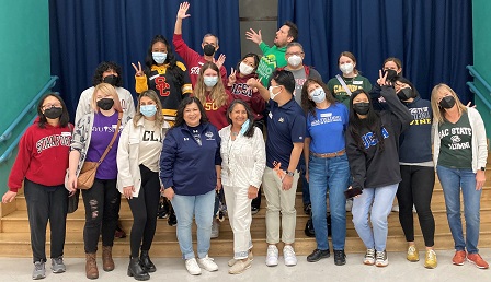 Volunteers at Esperanza showing their college spirit