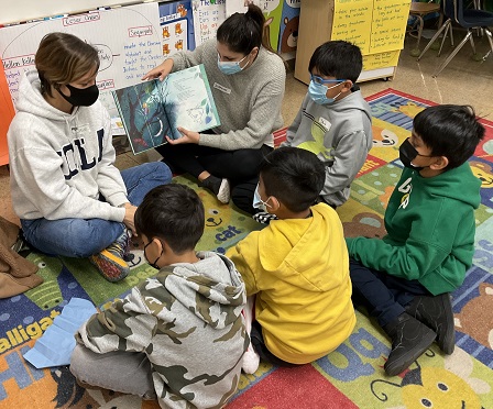 Reading to Kids at Magnolia Elem.