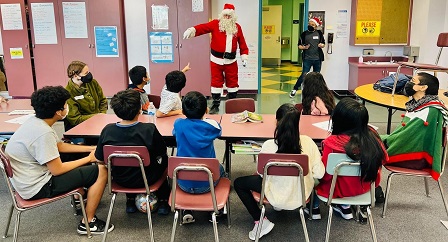 Santa visits the reading clubs at Charles White Elementary