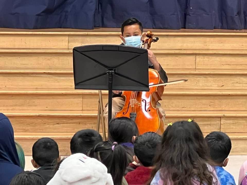 A student performing cello at Esperanza Elementary