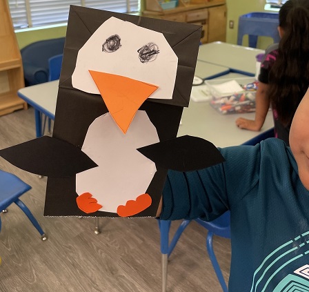 Kindergartner penguin craft at MacArthur Park Elementary