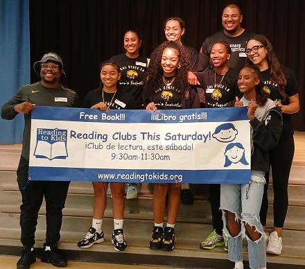 CSULA basketball players and coaches volunteering at MacArthur Park Elem. reading clubs