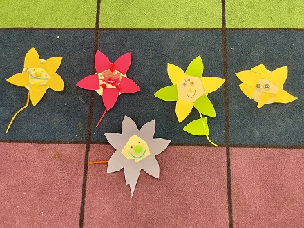 Sunflower crafts spread on a carpet