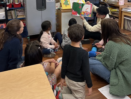 Kindergartners at Alta Loma Elem. enjoying Chicka Chicka Ho Ho Ho at the reading clubs