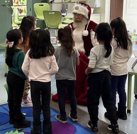 Santa visits the Magnolia Elementary reading clubs