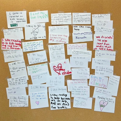 Buletin board filled with kid quotes about the reading clubs