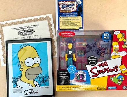 Autographed Simpsons items and Magic Castle certificate