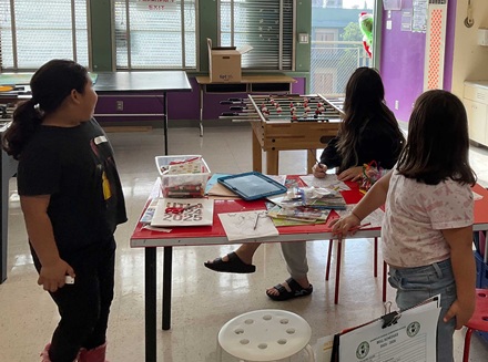 The Grinch looking for presents to steal at the Magnolia Elementary reading clubs