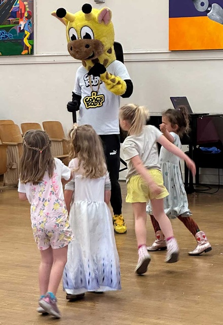 Devon Niko as Coach Kody at Alta Loma Elementary