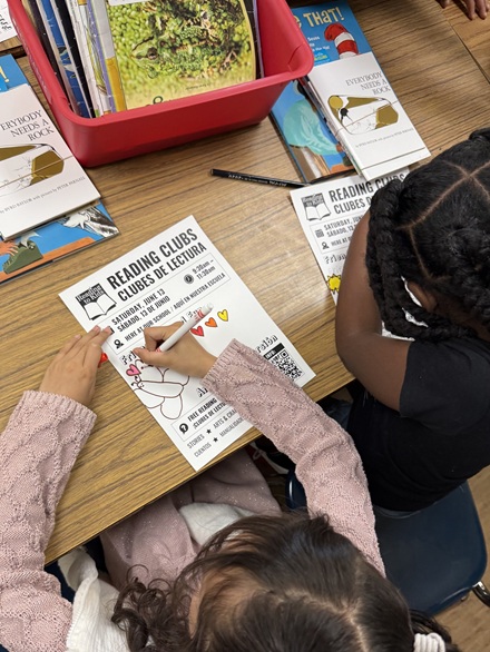 Kids creating flyers at the Alta Loma Elementary Career Day