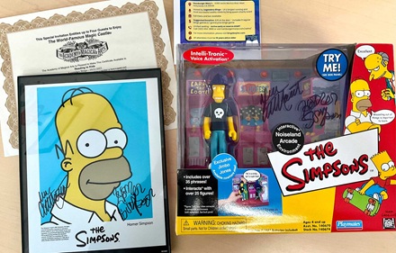 Autographed Simpsons items and Magic Castle certificate