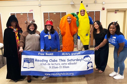 Magnolia Elem. volunteers wearing Halloween costumes