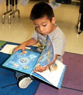 Boy with a prize book