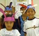 Kids wearing their crafts after reading clubs